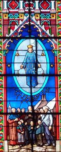L'apparition de Pontmain. Vitrail de la Basilique.