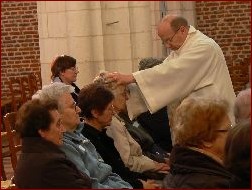 Imposition des mains sur la tête